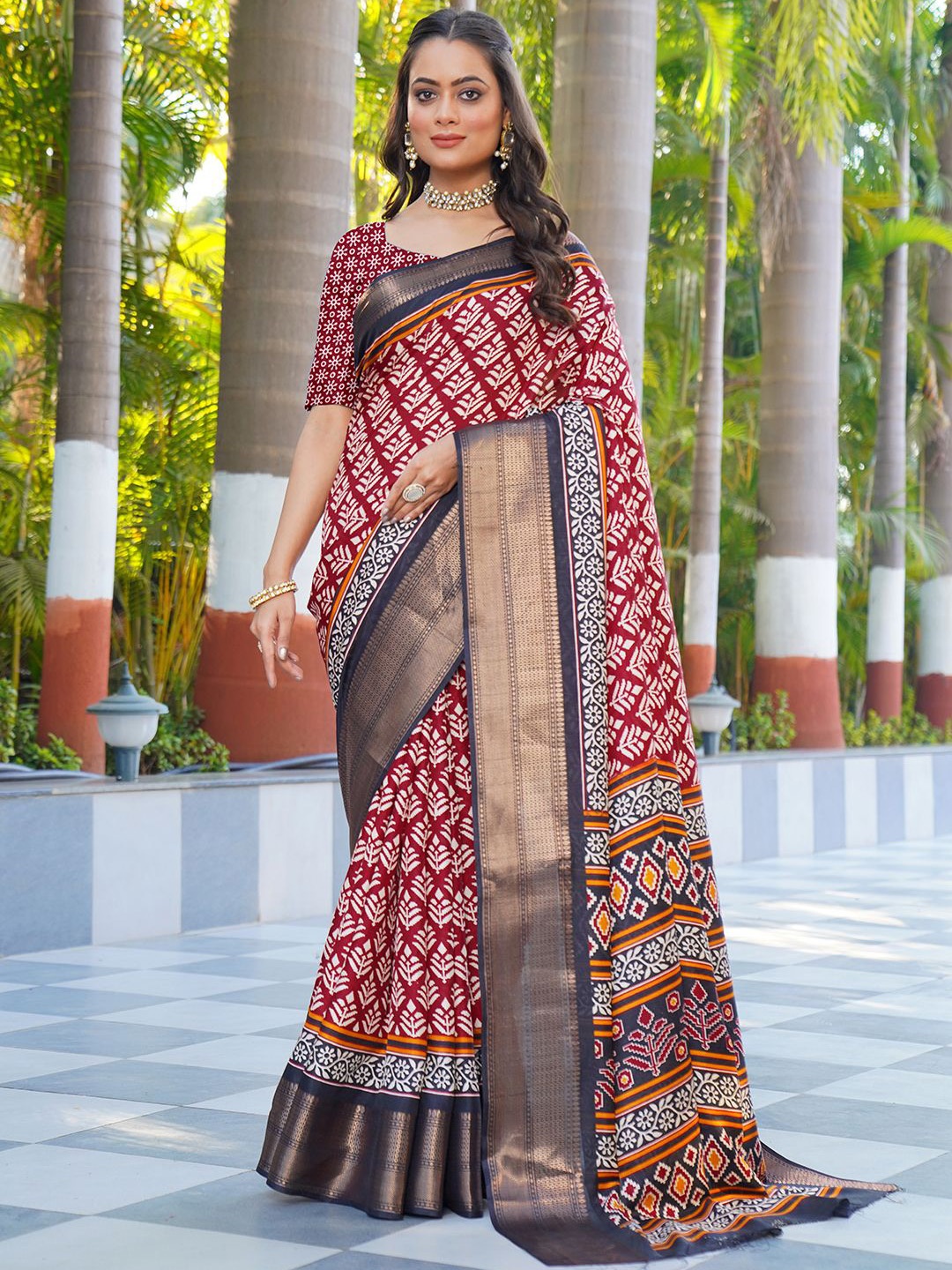 

NIRMAL CREATION Floral Zari Saree, Maroon