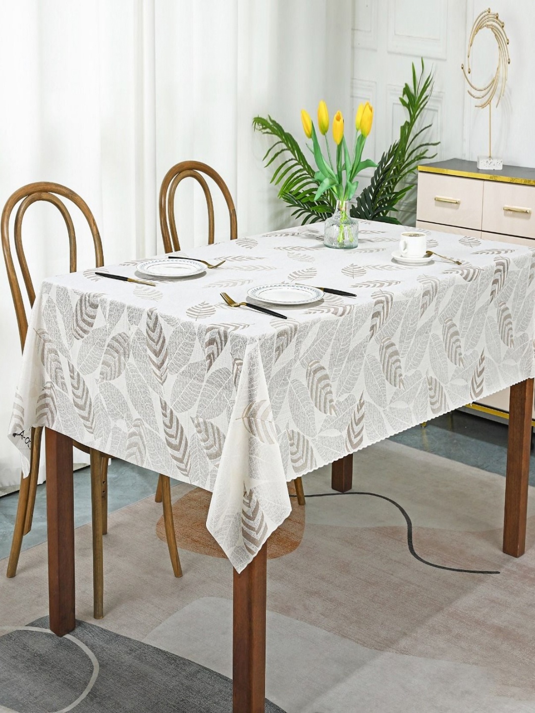 

Dakshya Industries White Floral Waterproof Plastic 6-Seater Table Cover