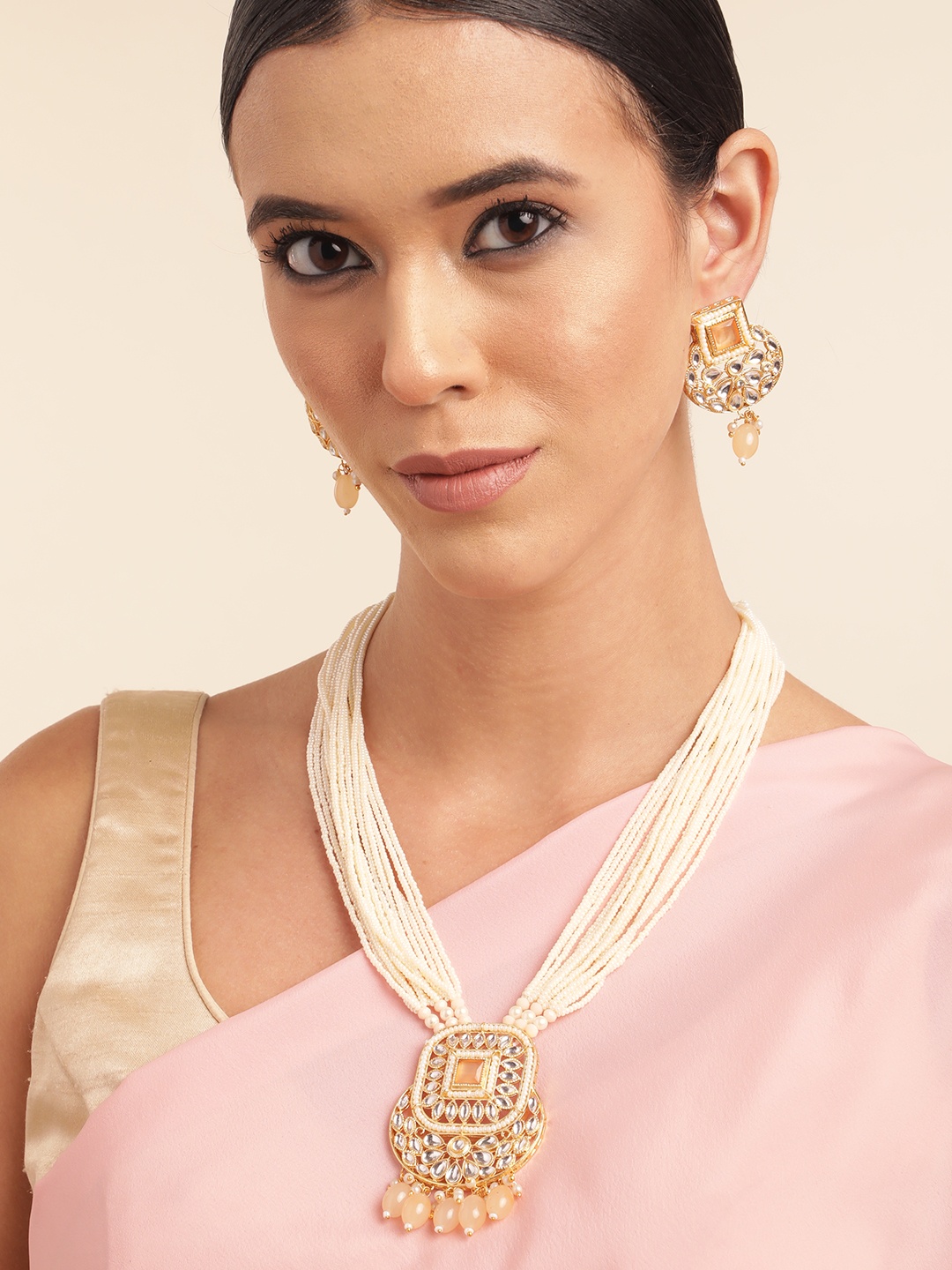 

Anouk Gold Plated Kundan Studded Beaded Premium Layered Necklace Earring Set, Peach