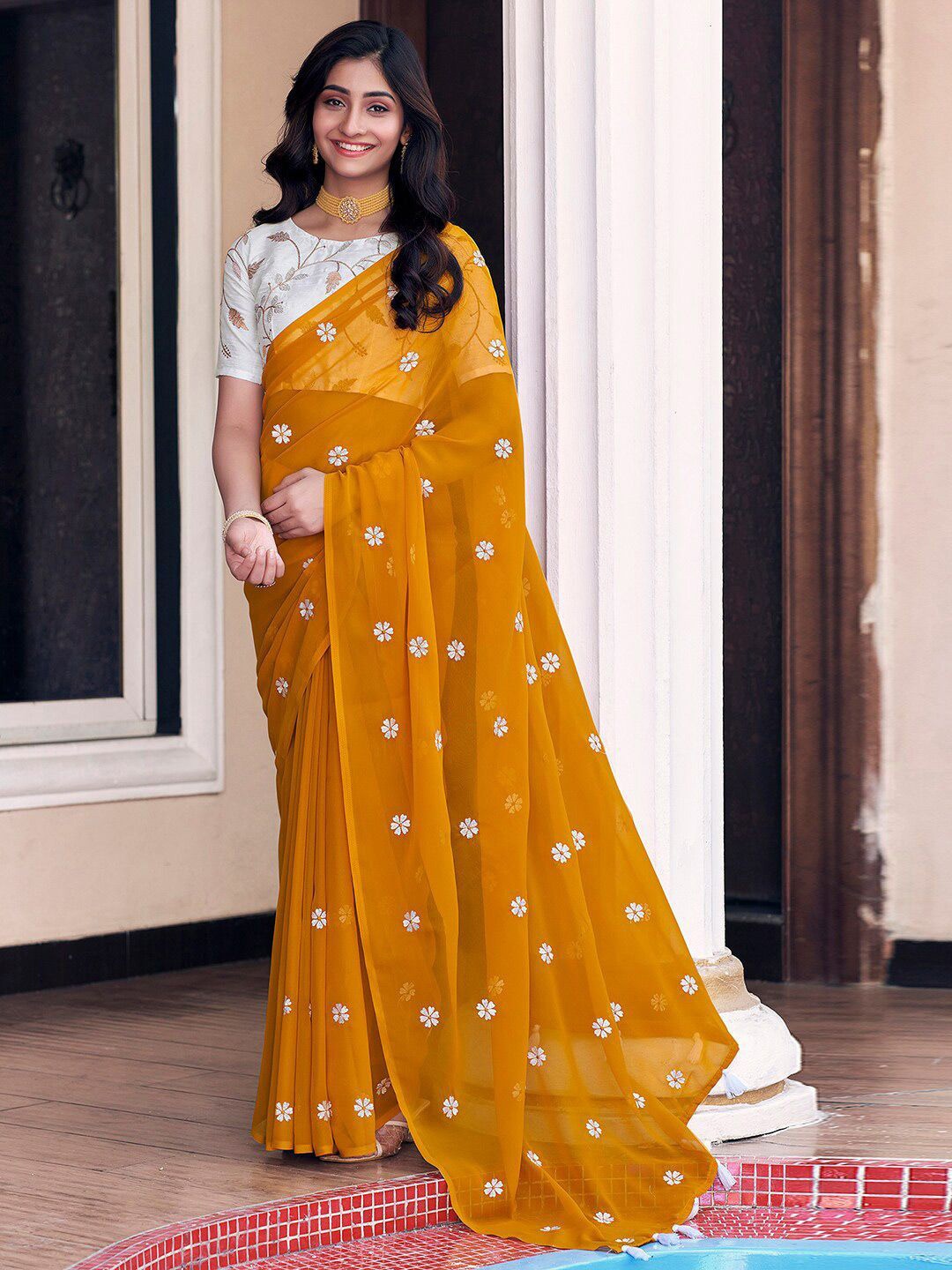 

DIVASTRI Floral Embroidered Pure Georgette Dabu Saree, Yellow