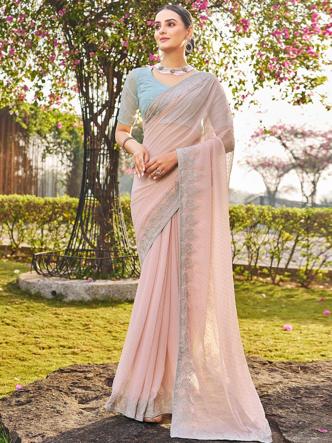 

DIVASTRI Ethnic Motifs Beads and Stones Pure Georgette Saree, Peach