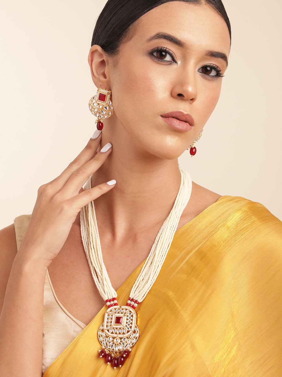 

Anouk Gold Plated Kundan Studded Beaded Premium Layered Necklace Earring Set, Maroon