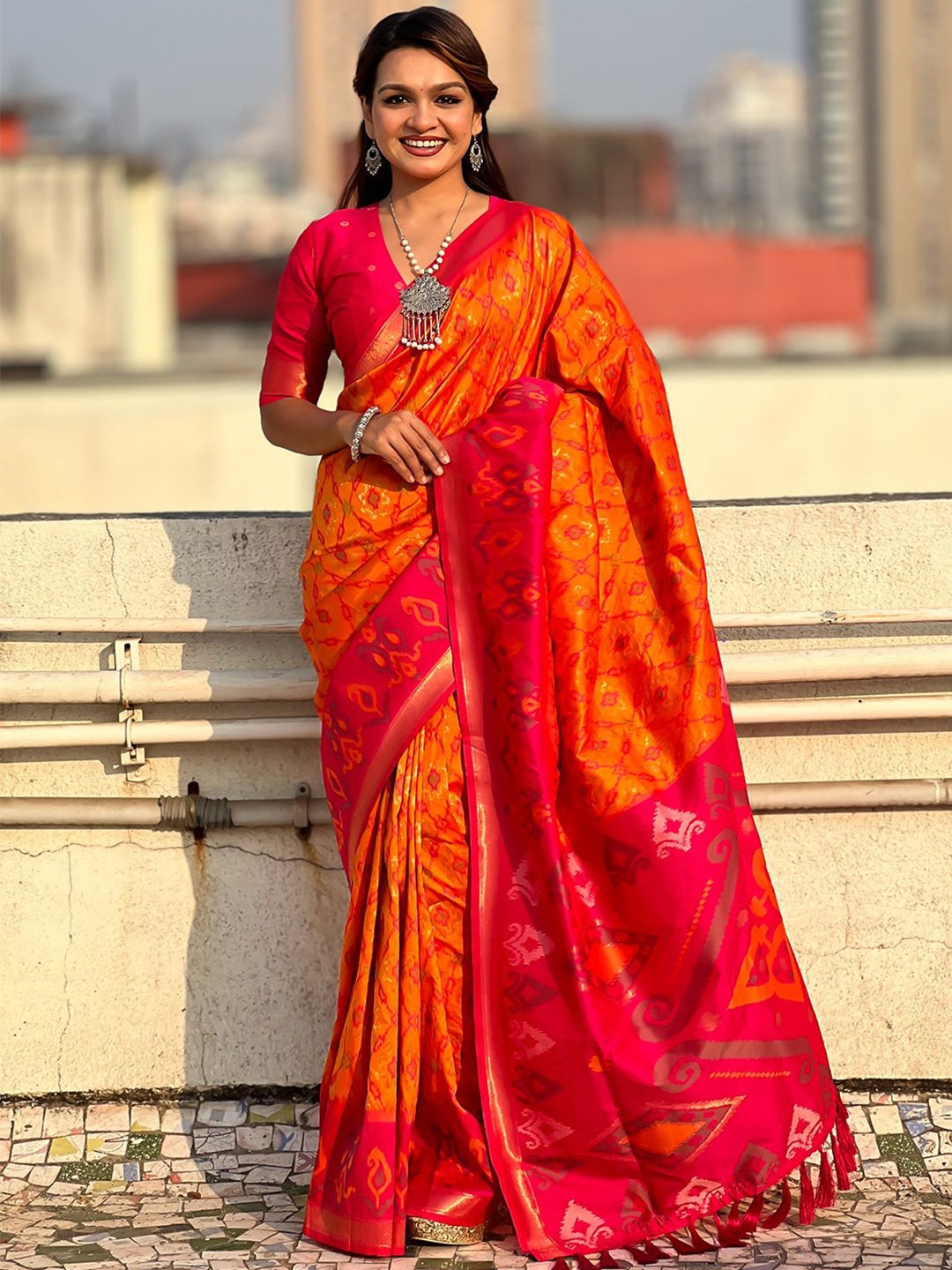

Panzora Woven Design Zari Silk Blend Patola Saree, Orange
