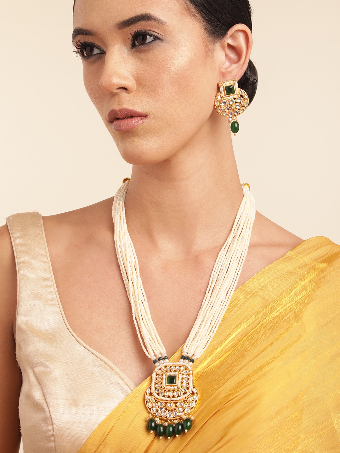 

Anouk Gold Plated Kundan Studded Beaded Premium Layered Necklace Earring Set, Green