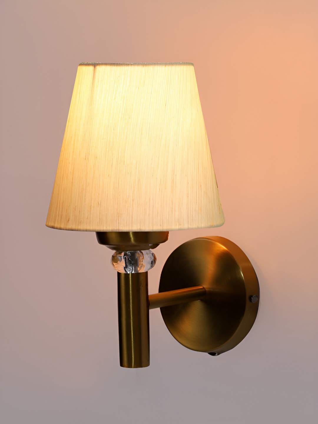 

Devansh Beige Metal Frustum Shaped Wall Lamp