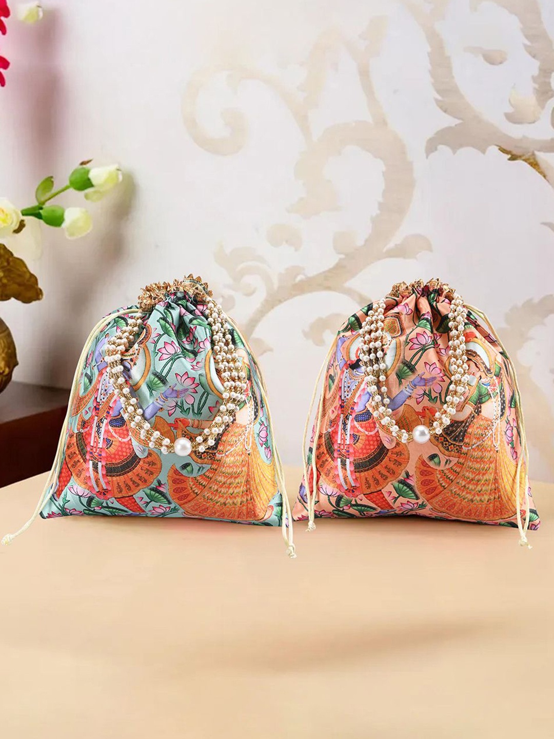 

Kuber Industries 2 Pcs Potli Bag For Women & Girls Radha Krishna Print Potli Clutch, Peach