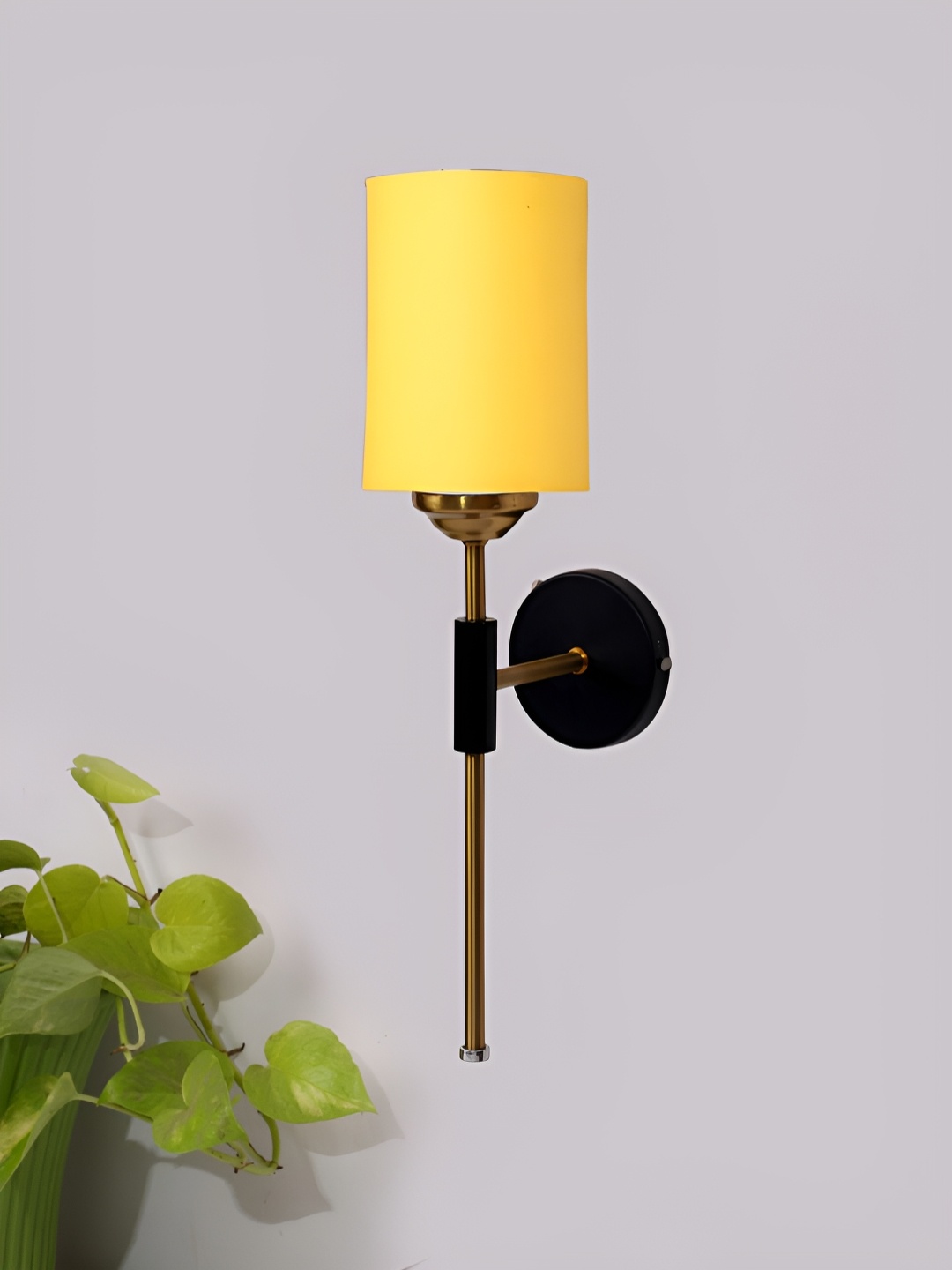 

Devansh Yellow & Black Metal Traditional Cylinder Shaped Wall Lamp