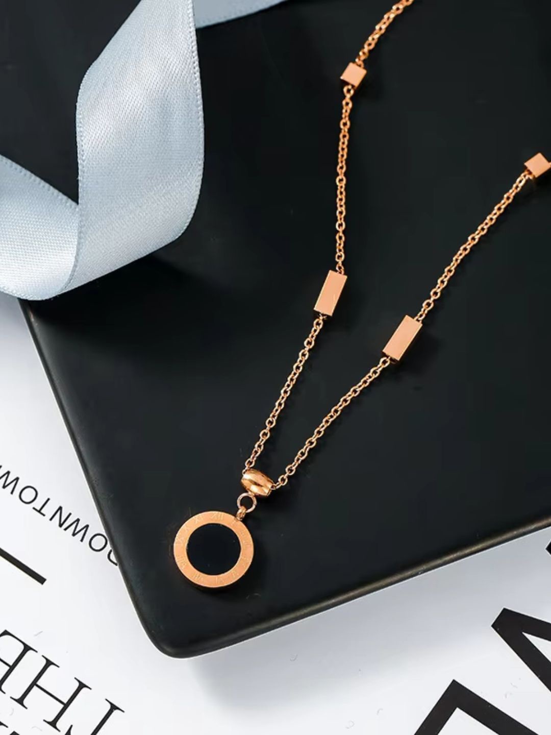 

Lyriss Rose Gold Plated Cubic Zirconia Studded Round Pendant With Chain