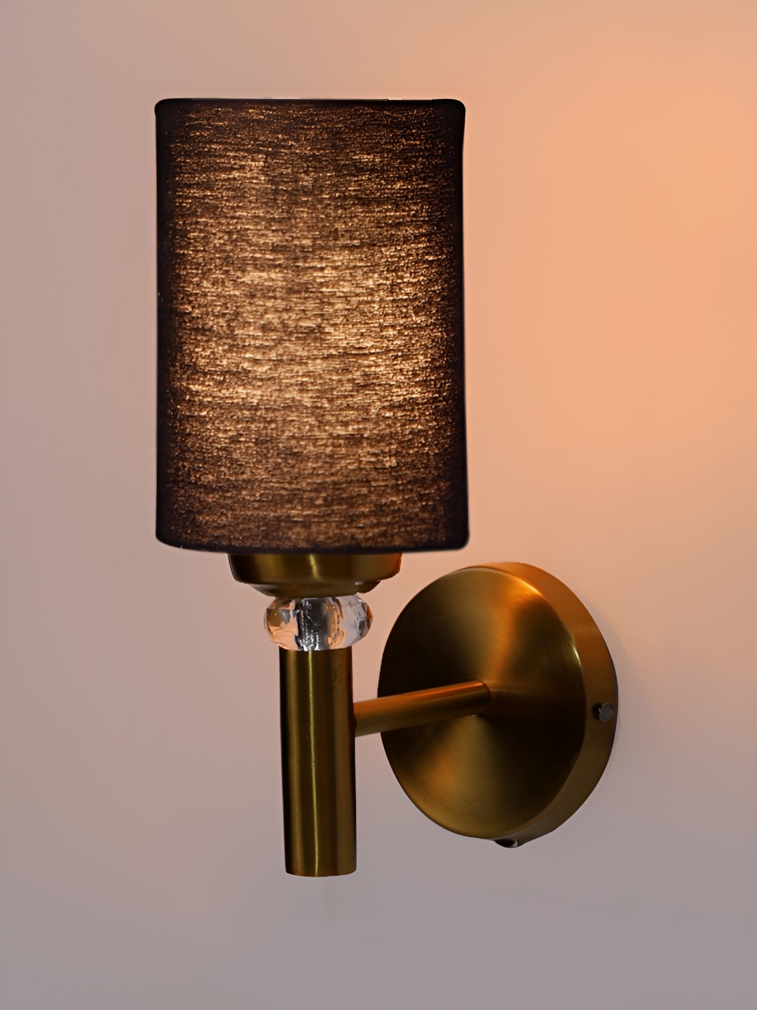 

Devansh Black Metal Cylinder Shaped Wall Lamp