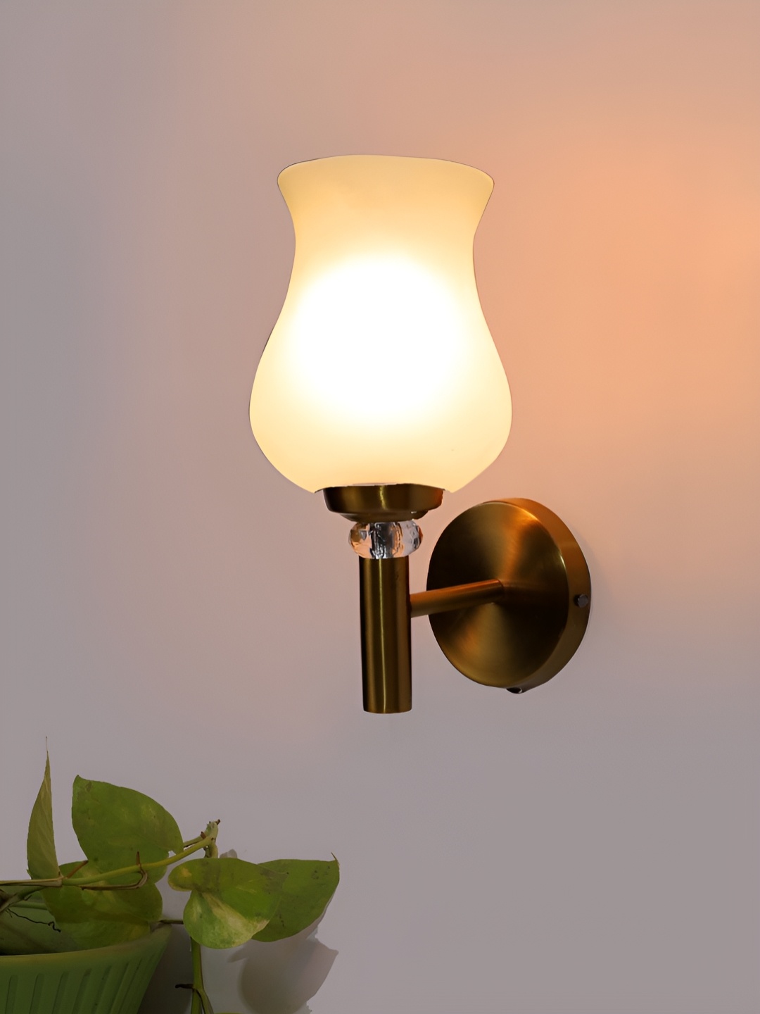 

Devansh White Metal Traditional Abstract Shaped Wall Lamp