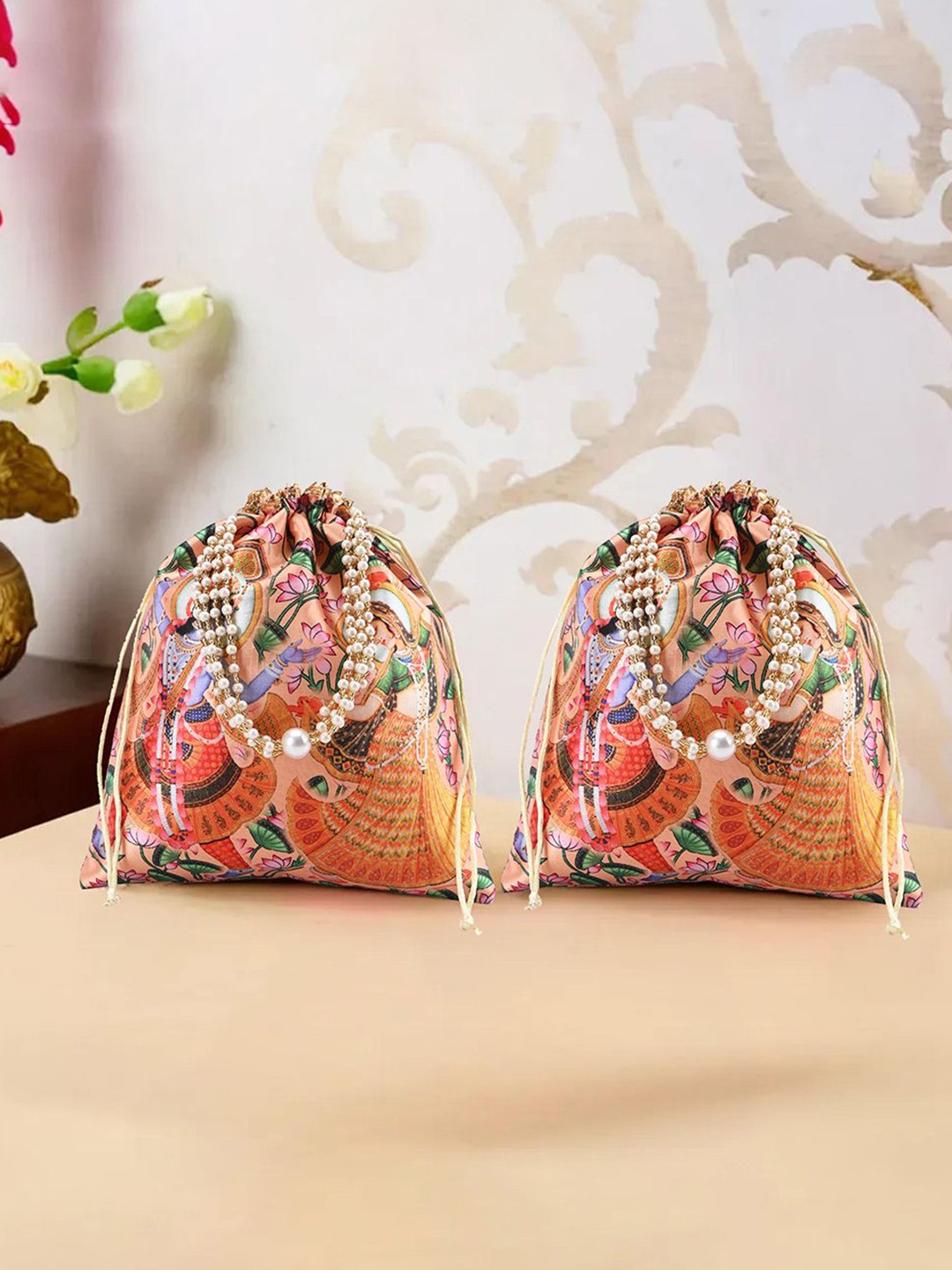 

Kuber Industries 2 Pcs Potli Bag For Women & Girls Radha Krishna Print Potli Clutch, Peach