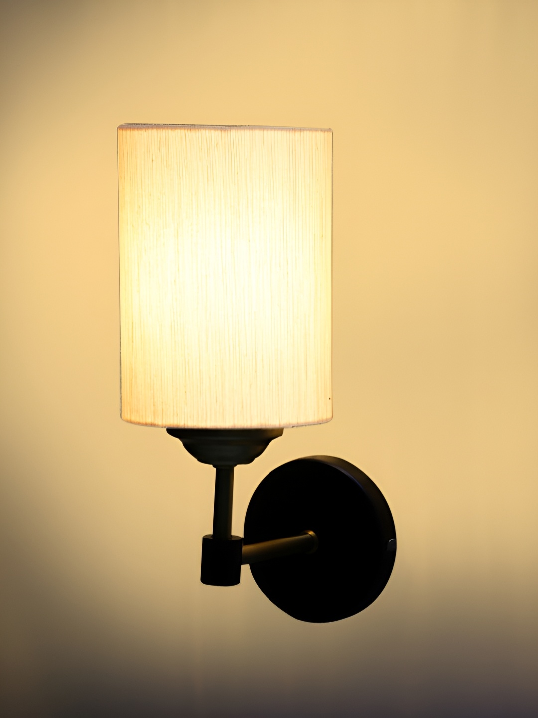 

Devansh Off White & Gold-Toned Metal Traditional Cylinder Shaped Wall Lamp