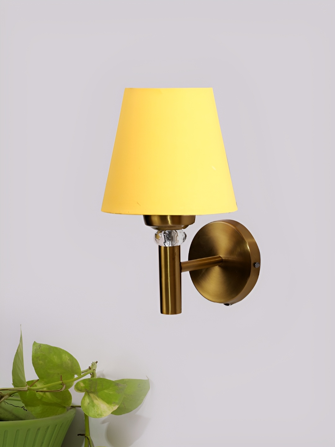 

Devansh Yellow Frustum Shaped Wall Lamp