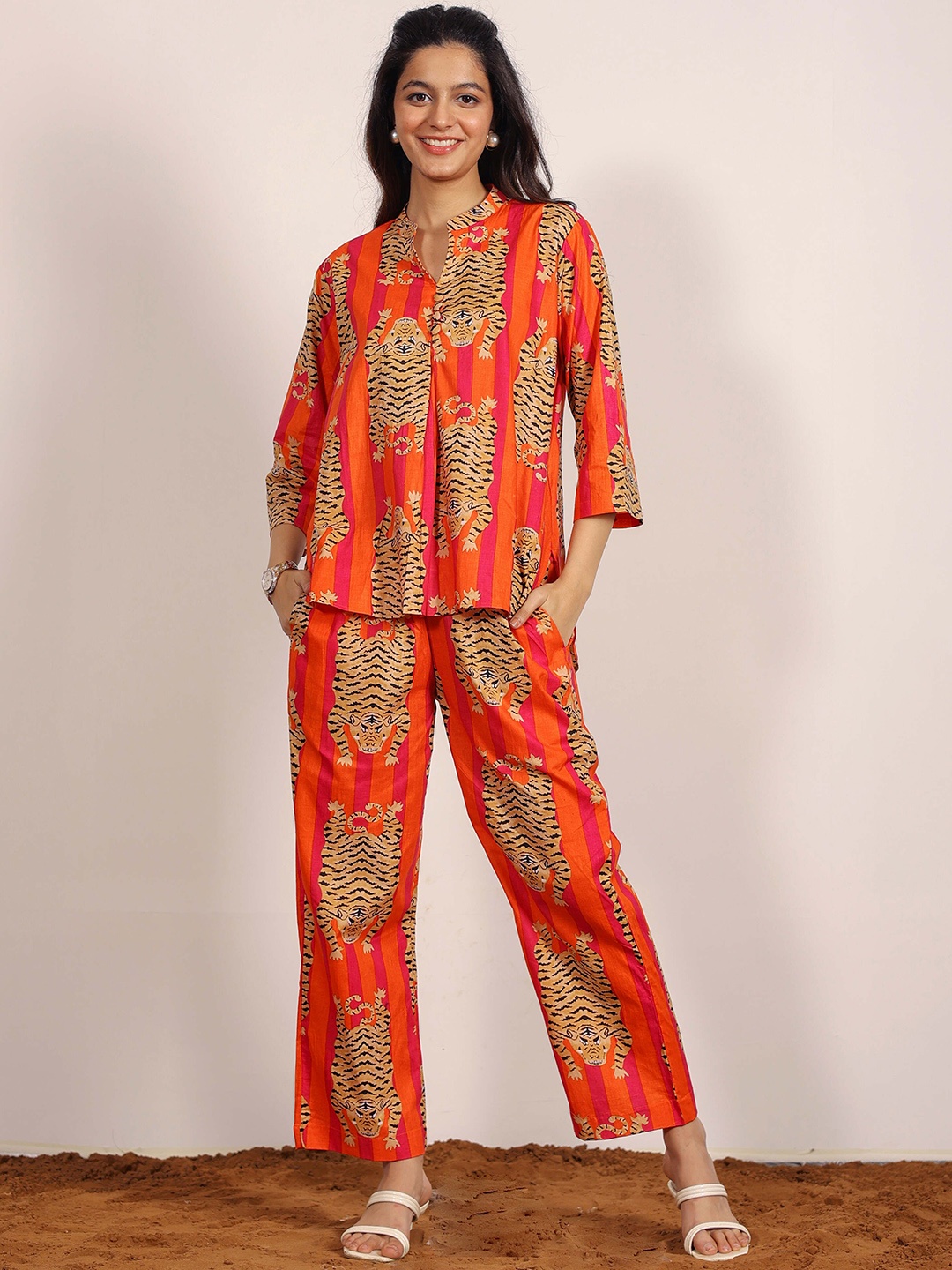 

KAORI BY SHREYA AGARWAL Printed Pure Cotton Mandarin Collar Neck Top & Trousers Co-Ords, Orange