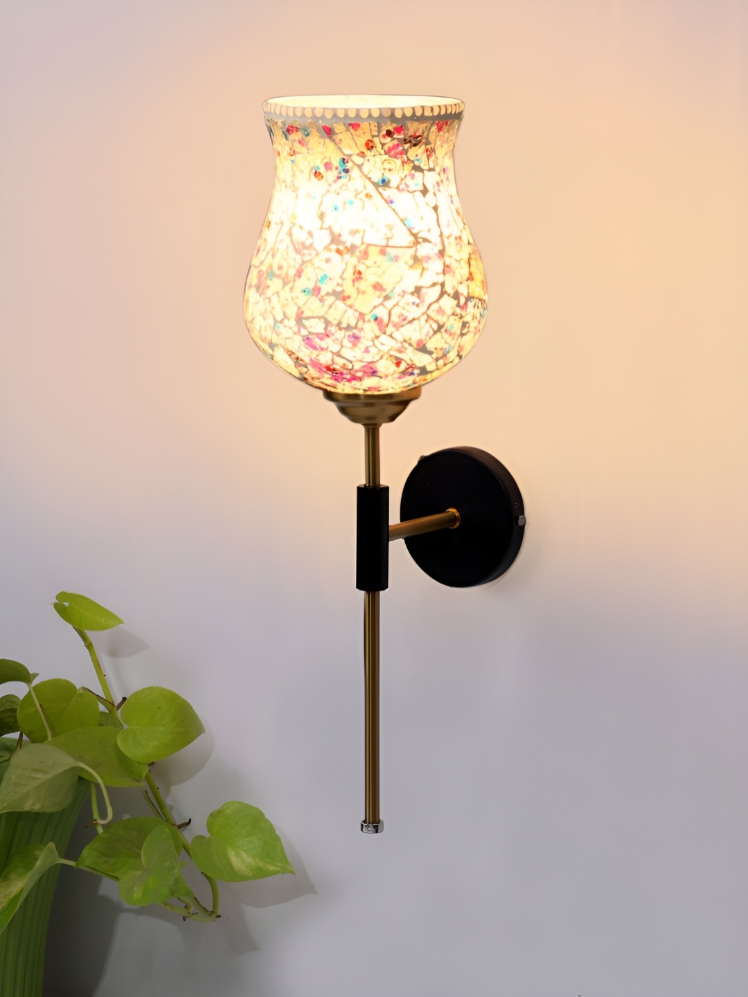 

Devansh White & Gold-Toned Printed Metal Traditional Abstract Shaped Shaped Wall Lamp