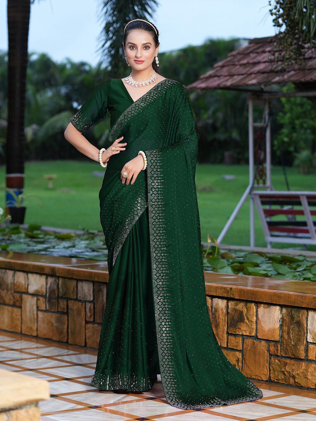 

DIVASTRI Embellished Beads and Stones Pure Georgette Saree, Green