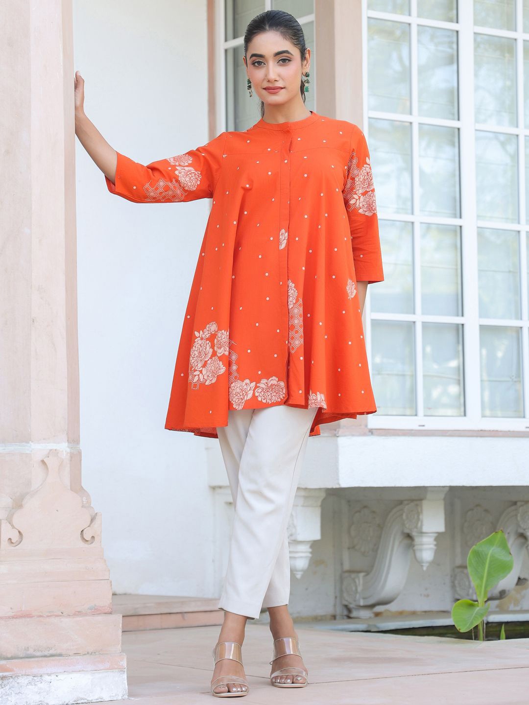 

Janasya Women's Orange Pure Cotton Floral Printed Flared Tunic