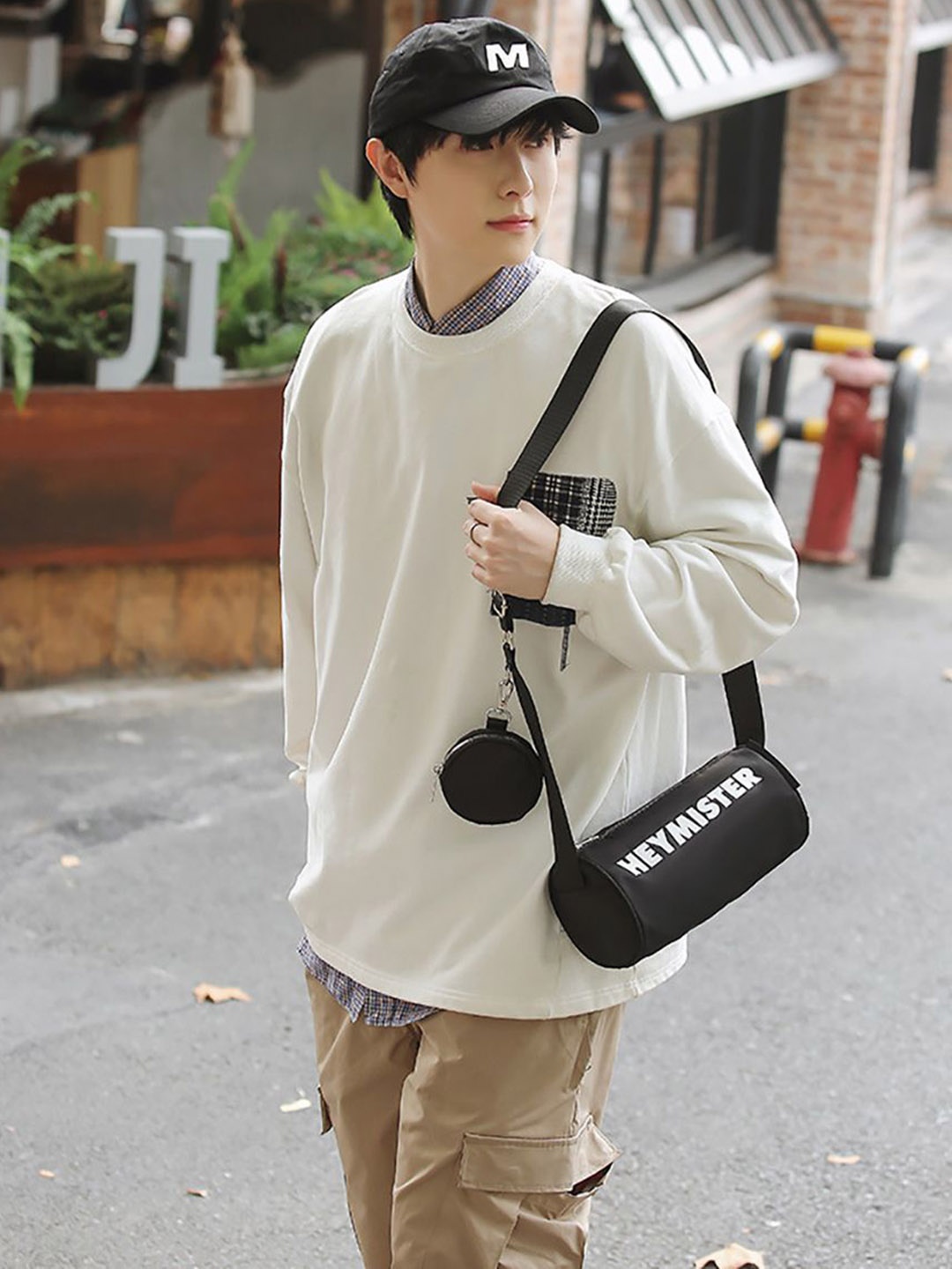 

StyleCast x Revolte Sling Bag, Black