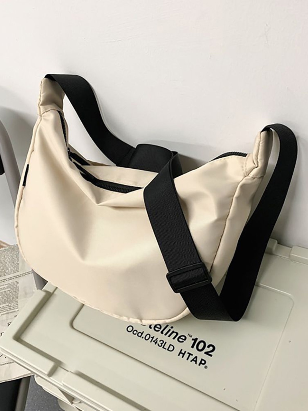 

StyleCast x Revolte Sling Bag, Off white
