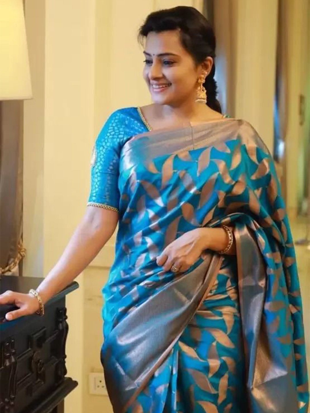 

KALINI Woven Design Zari Poly Georgette Banarasi Saree, Teal