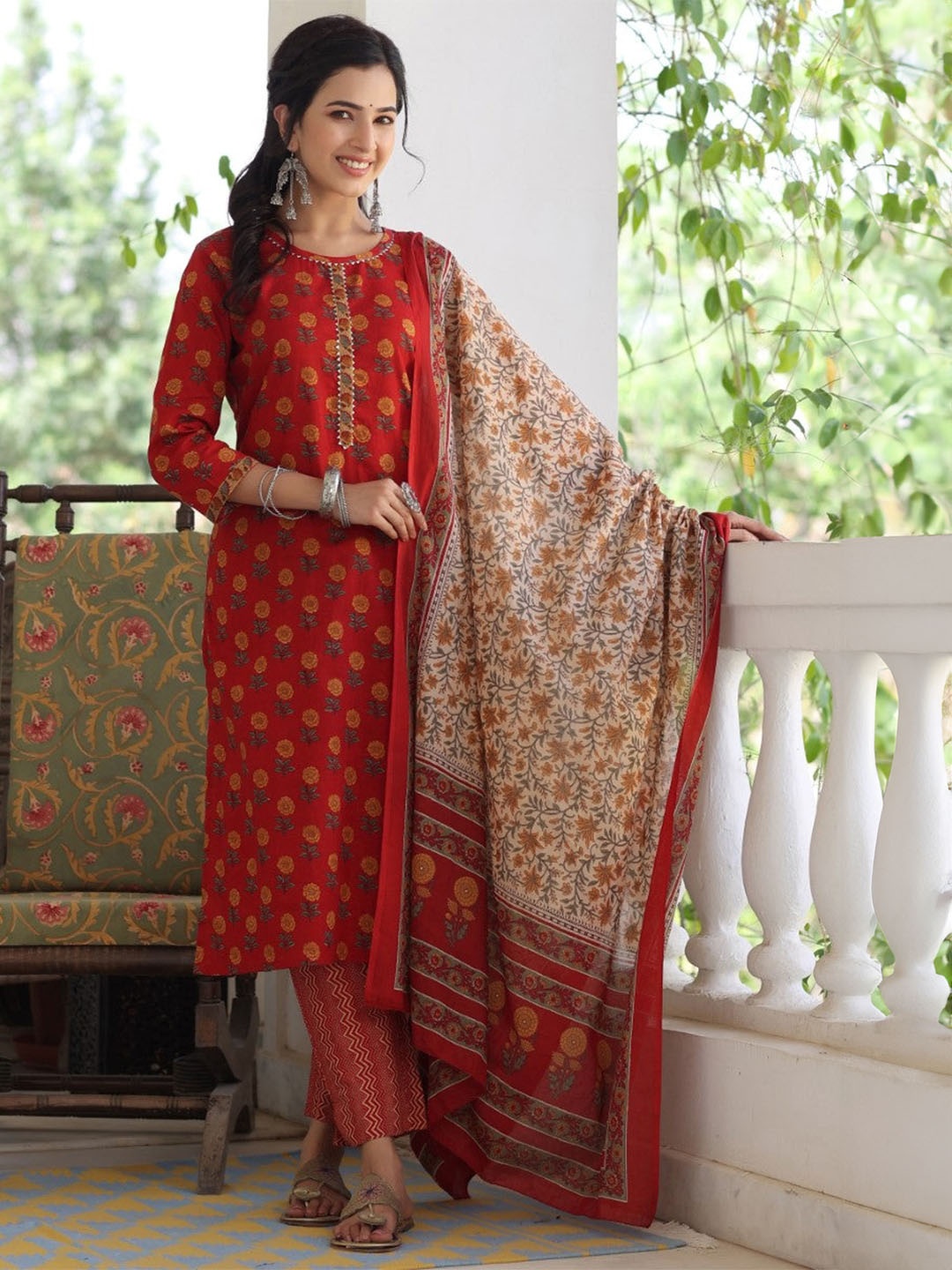 

Piludi Women Floral Printed Regular Kurta with Trousers & With Dupatta, Rust