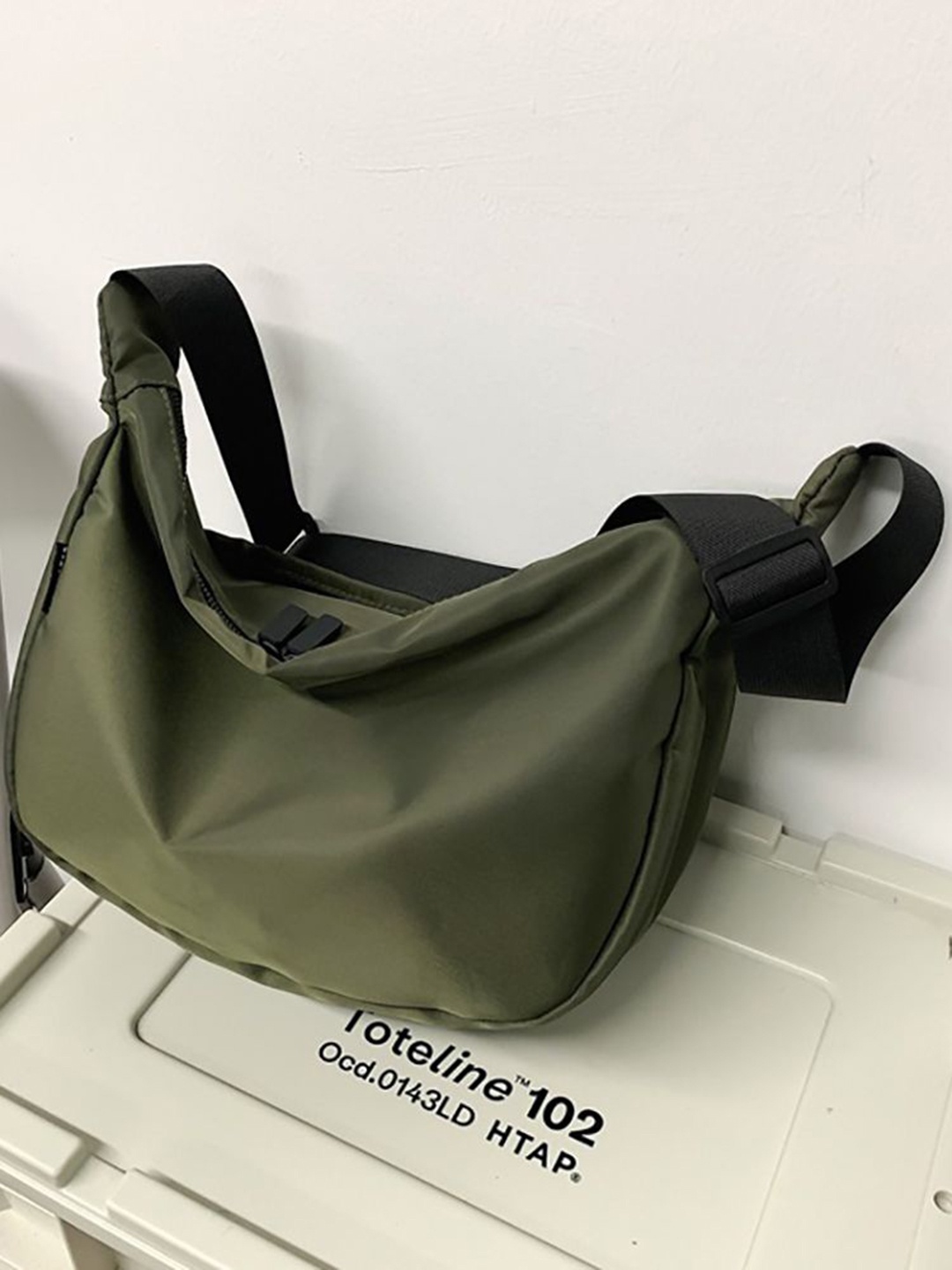 

StyleCast x Revolte Sling Bag, Green
