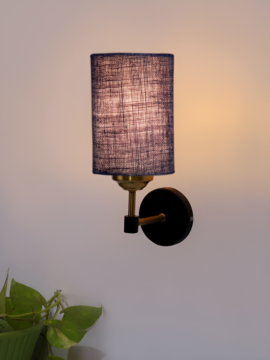 

Devansh Blue Metal Traditional Cylinder Shaped Wall Lamp