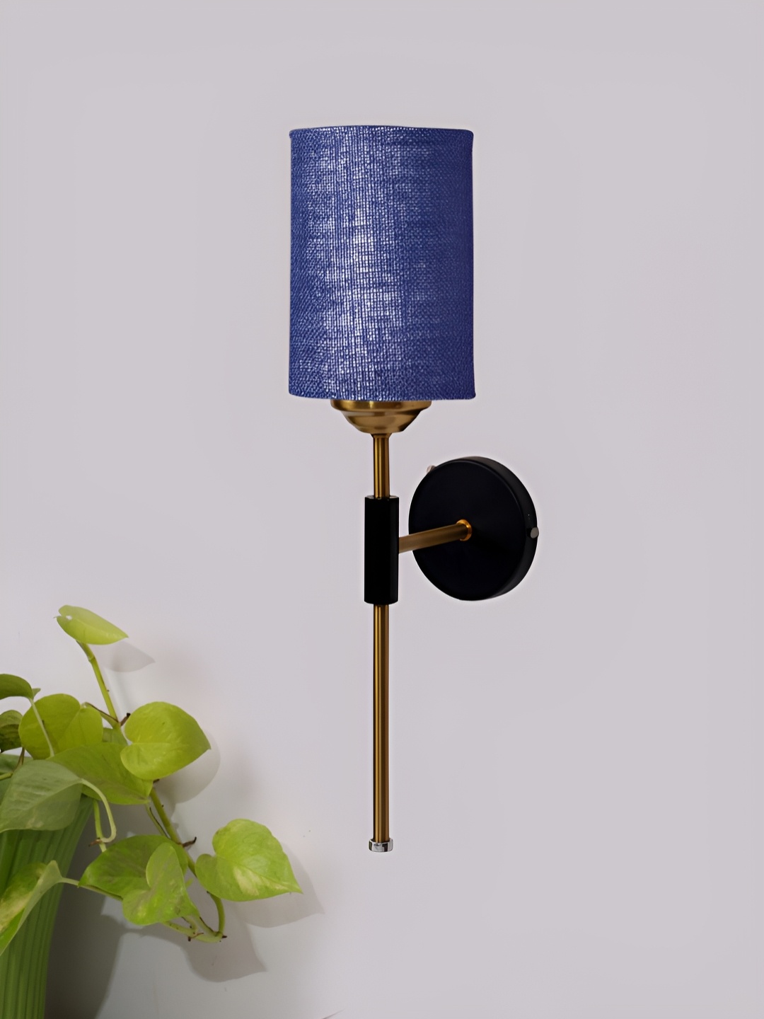 

Devansh Blue & Black Metal Traditional Cylinder Shaped Wall Lamp