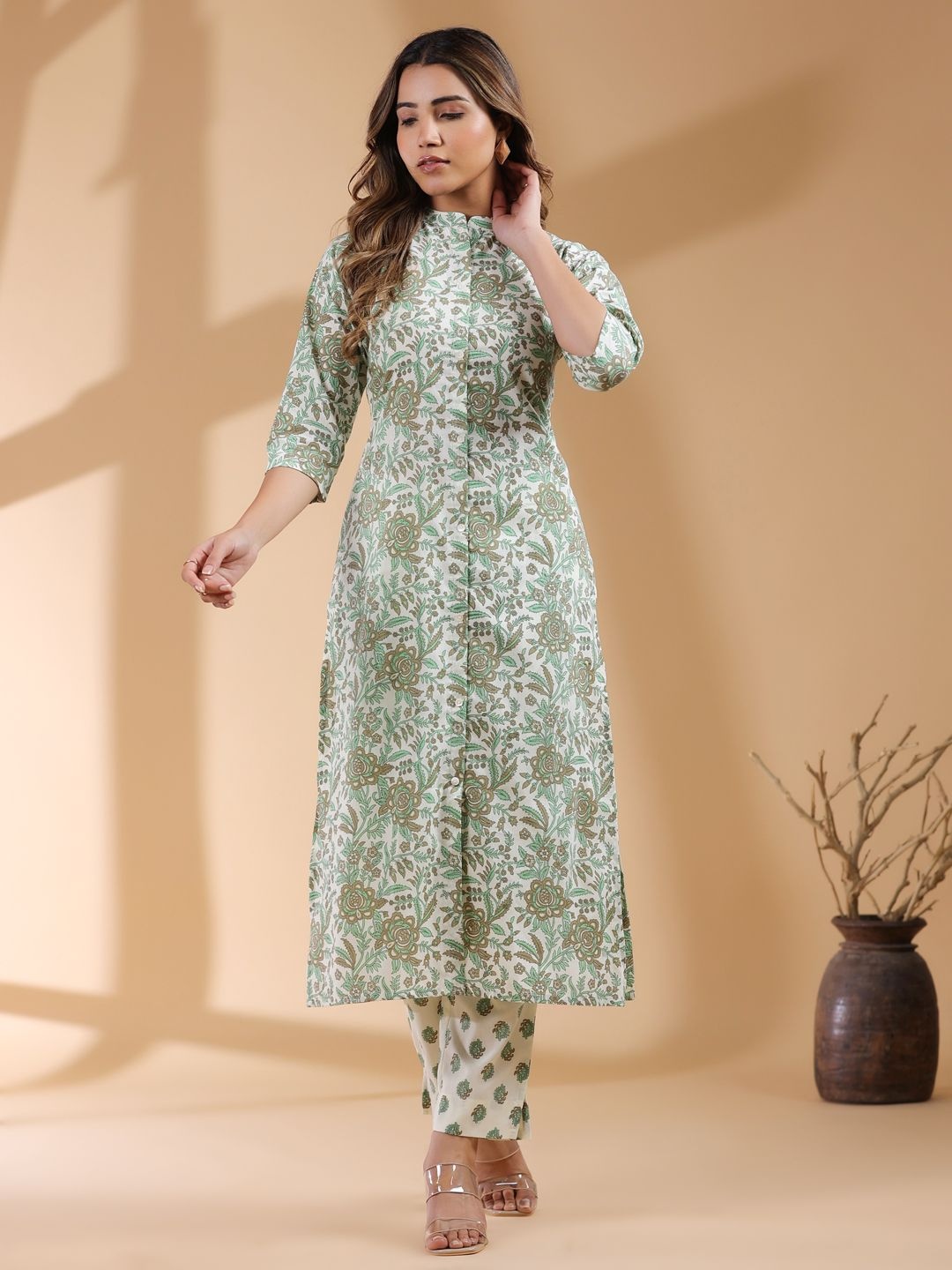 

Janasya Women Cream Pure Cotton Floral Printed Straight Kurta Pant Set