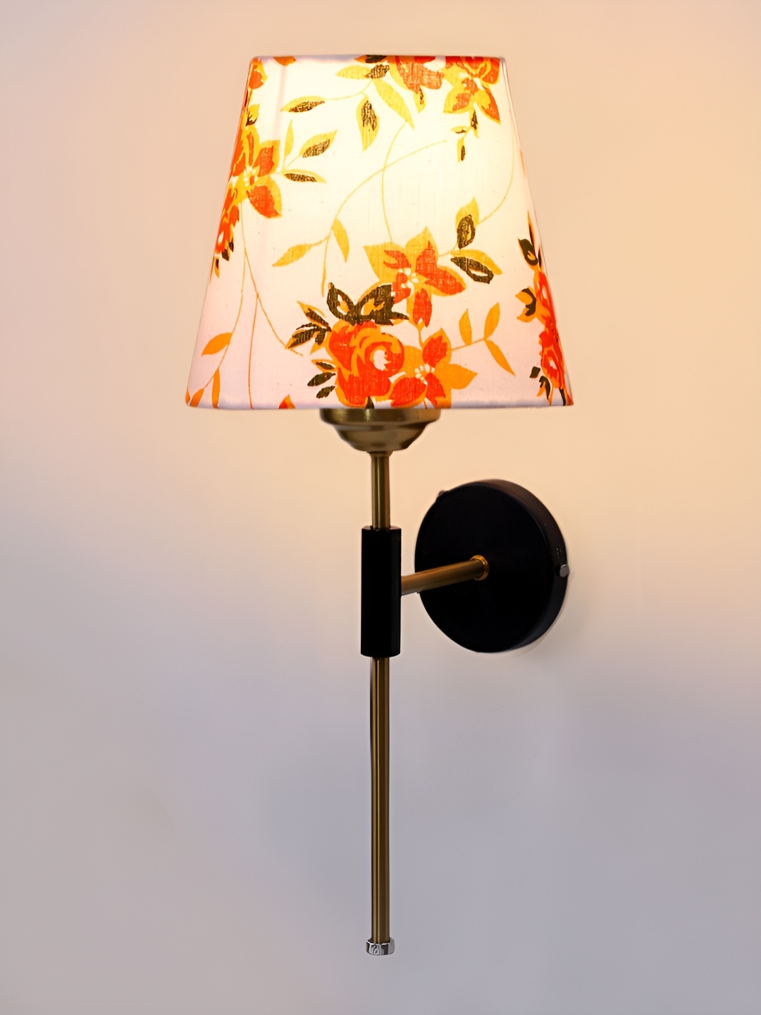 

Devansh White & Gold-Toned Printed Metal Traditional Frustum Shaped Wall Lamp