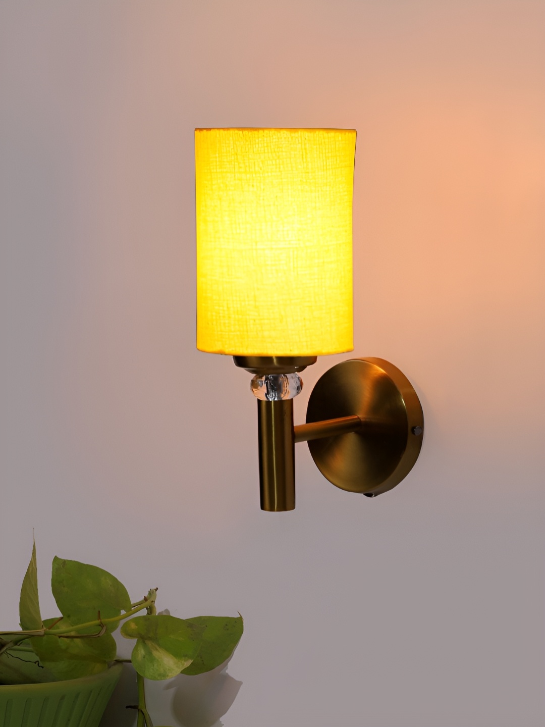 

Devansh Yellow Traditional Abstract Shaped Shaped Wall Lamp