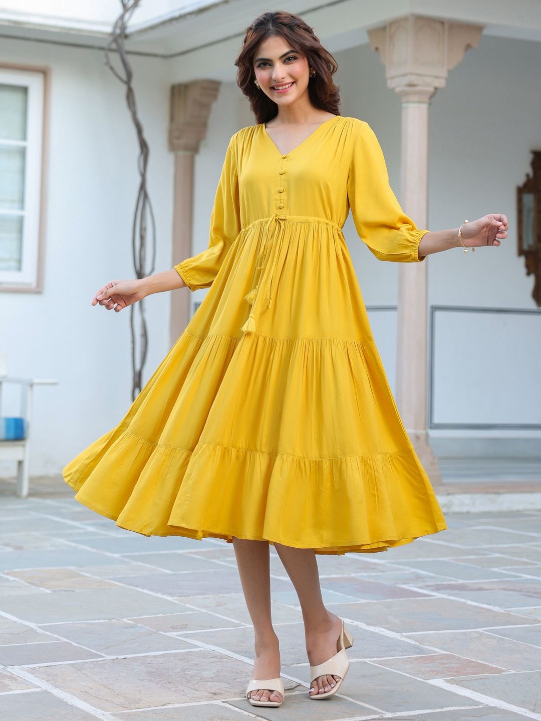 

Janasya Women Yellow Rayon Solid Tiered Dress