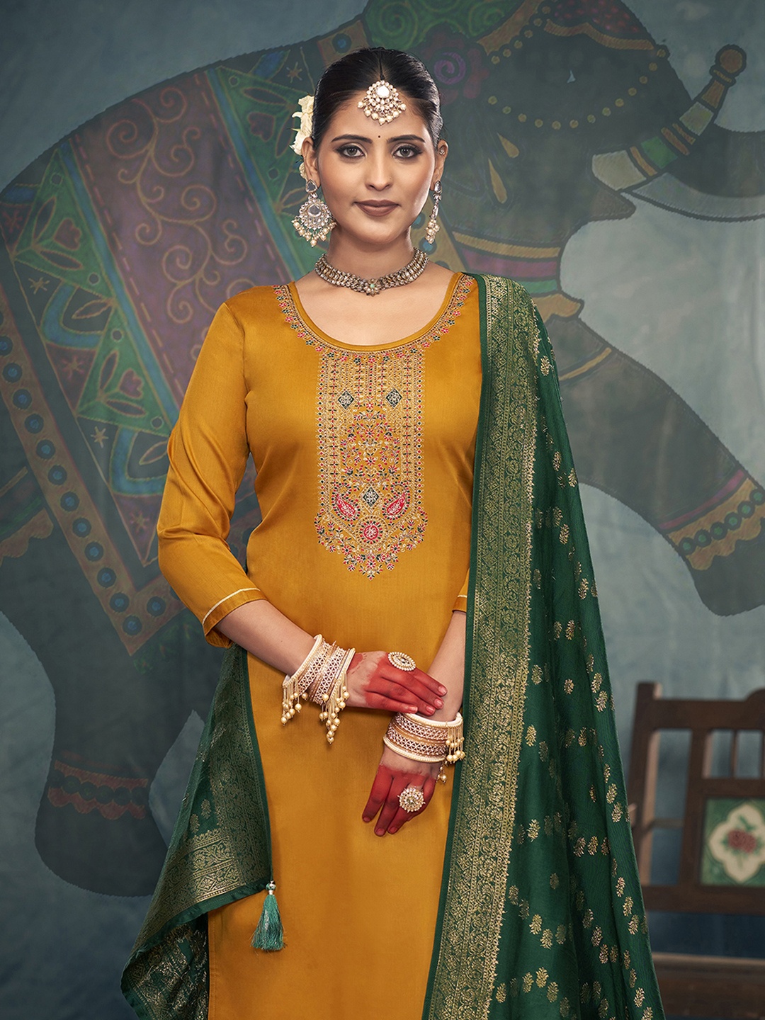 

Anouk Yellow Floral Embroidered Beads And Stones Unstitched Dress Material