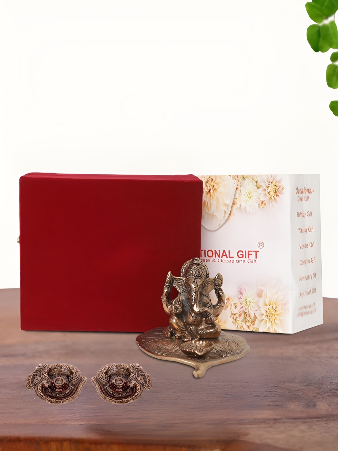 

INTERNATIONAL GIFT Brown Leaf Ganesh Idol with 2 Diya Box and Bag, Copper