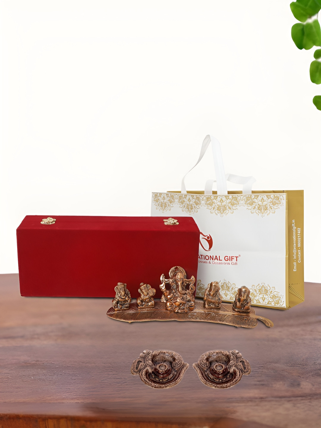 

INTERNATIONAL GIFT Brown Musical Ganesh Idol with 2 Diya and Box, Copper