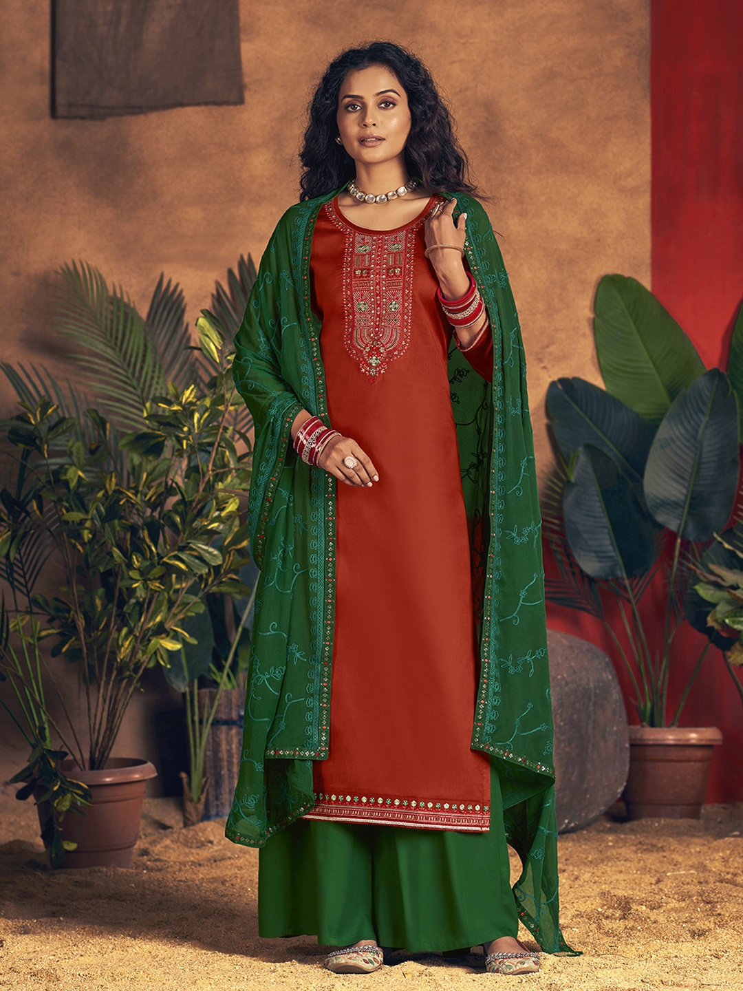 

Anouk Orange Ethnic Motifs Embroidered Zari Work Unstitched Dress Material