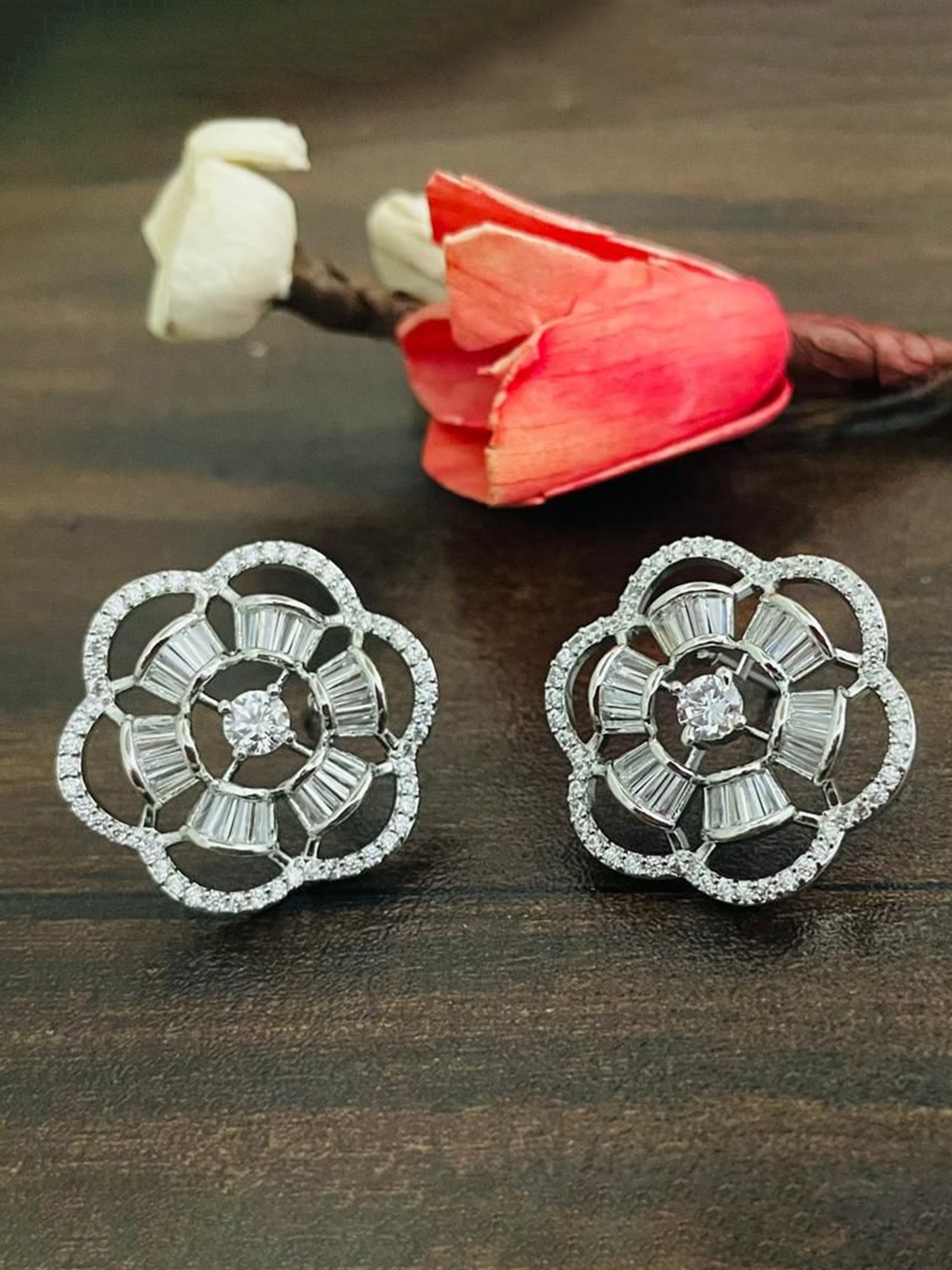 

MONI LIFESTYLE Silver Plated American Diamond Studded Floral Shaped Studs