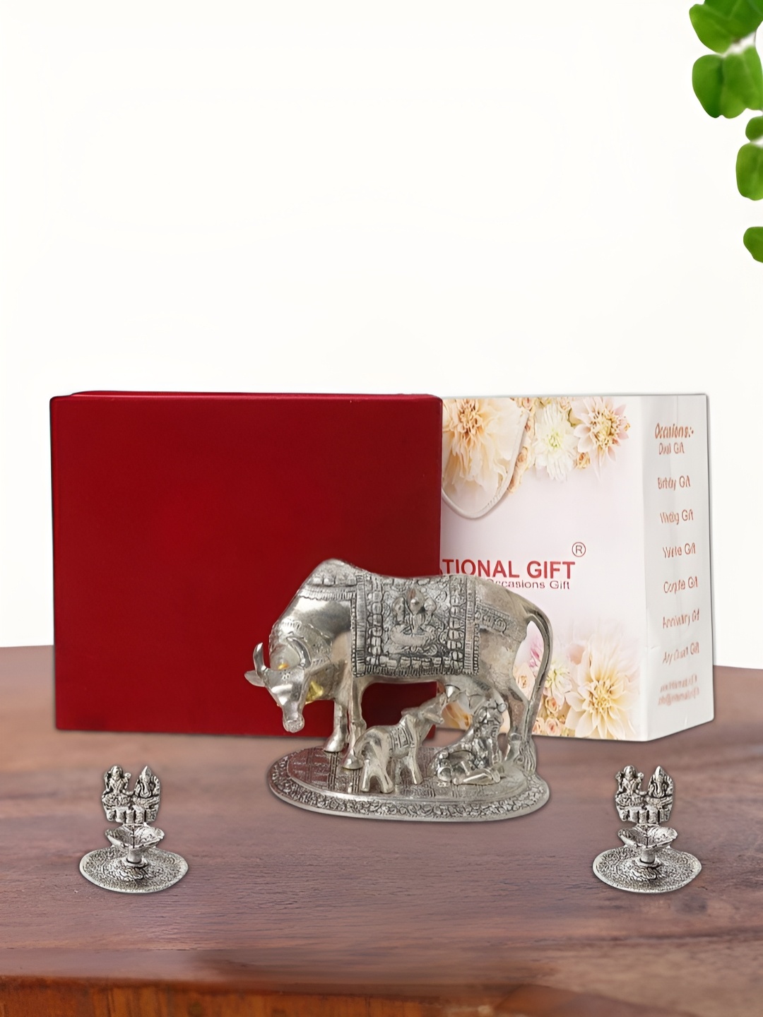 

INTERNATIONAL GIFT Silver Plated Kamdhenu Cow with 2 Diya Box and Bag