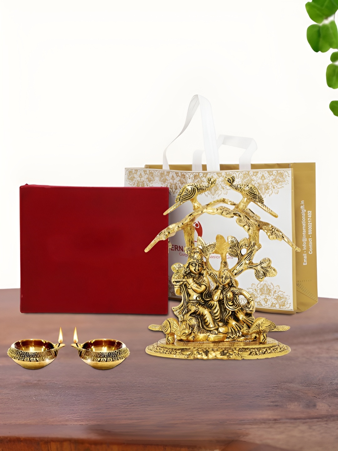 

INTERNATIONAL GIFT Gold Plated Radha Krishna Idol with 2 Diya Box and Bag