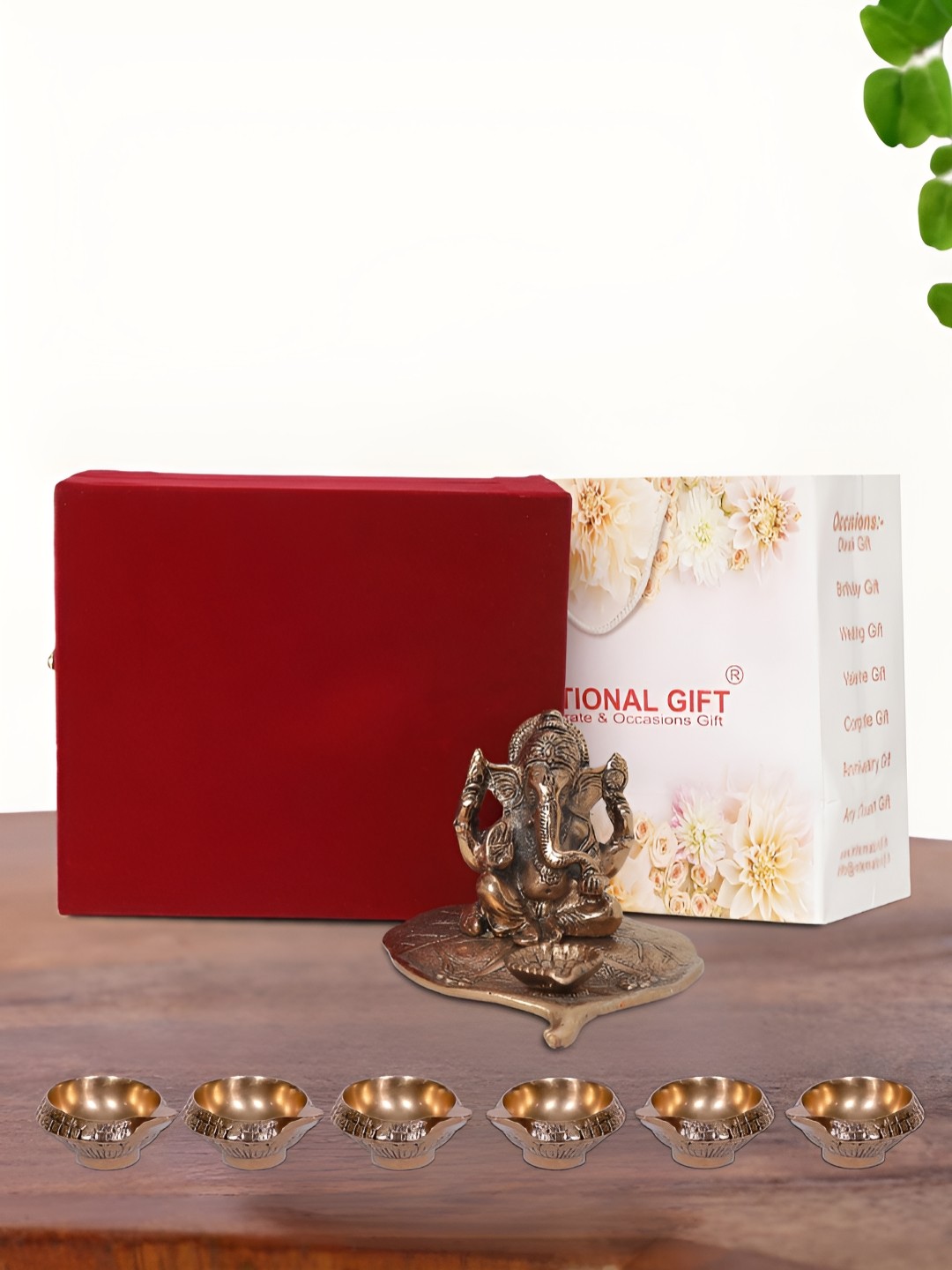 

INTERNATIONAL GIFT Brown Leaf Ganesh Idol with 6 Diya Box and Bag, Copper