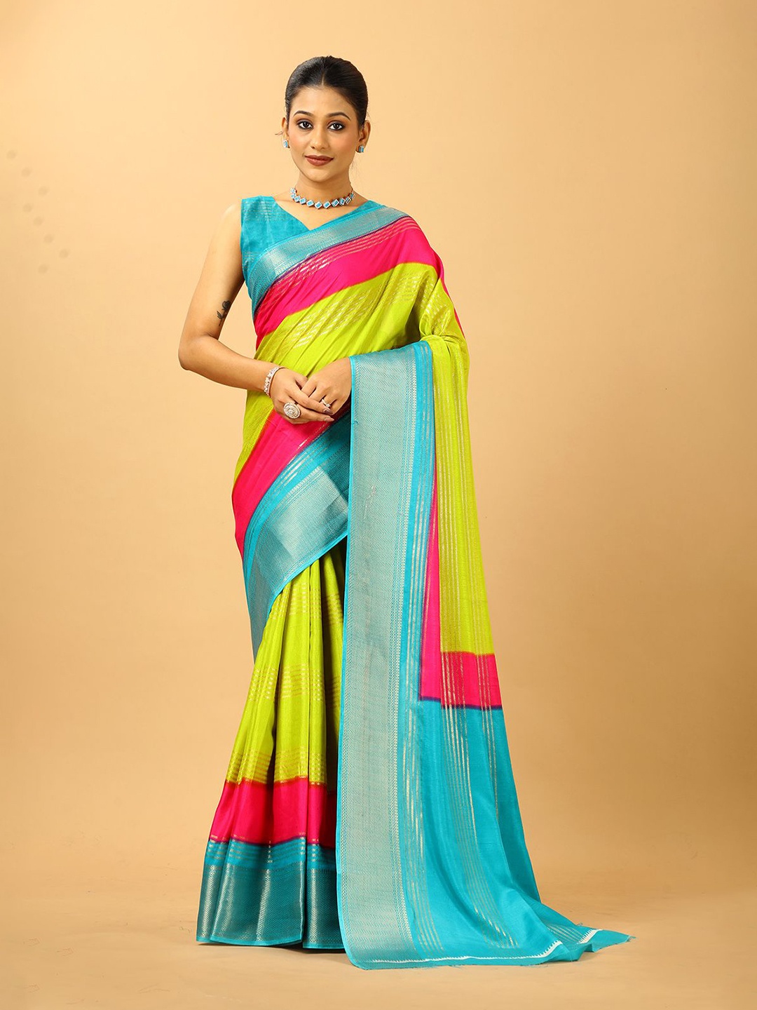 

A.V.M. SILK MILLS Colourblocked Zari Saree, Turquoise blue