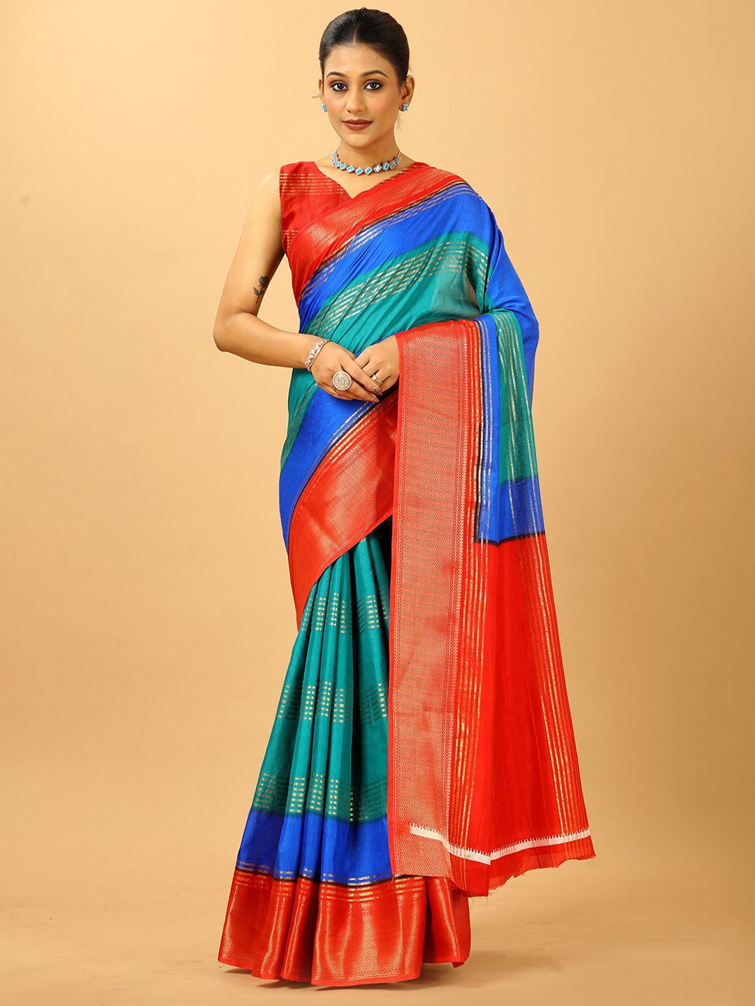

A.V.M. SILK MILLS Colourblocked Zari Saree, Red