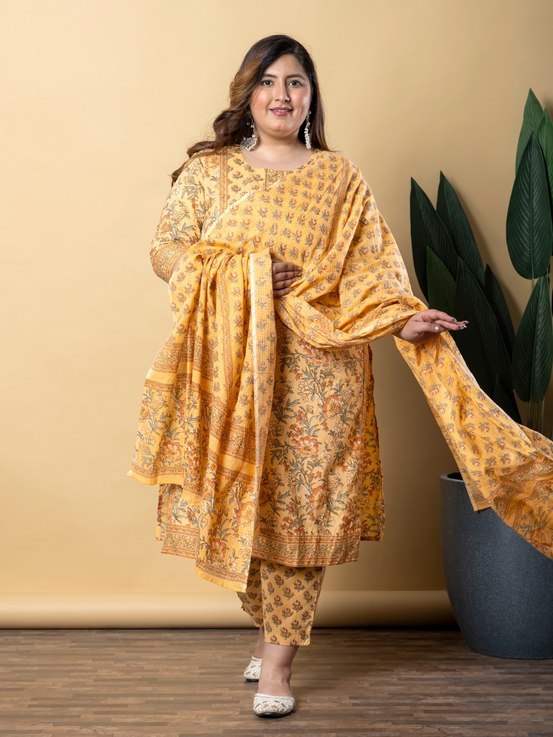 

Readiprint Women Floral Printed Regular Beads and Stones Pure Cotton Kurta with Palazzos & With, Yellow