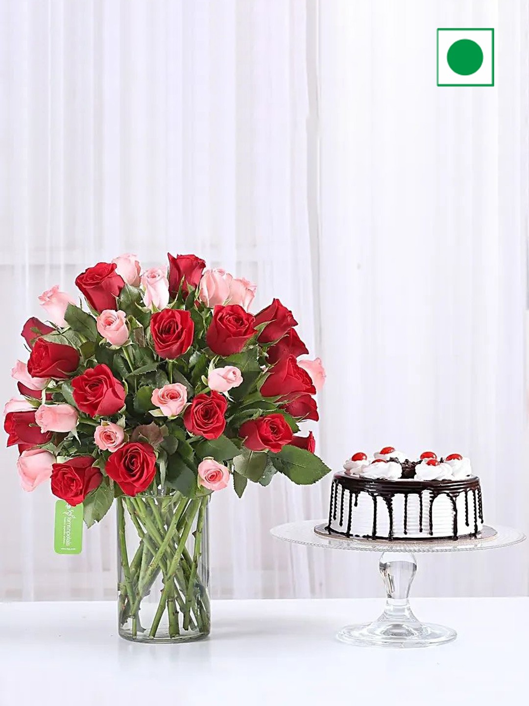 

fnp 30-Pcs Fresh Pink & Red Roses In Glass Vase with Black Forest Cake - 500 g