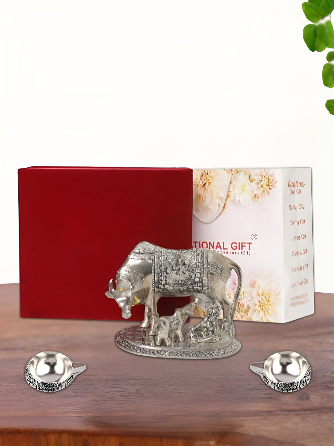 

INTERNATIONAL GIFT Silver Plated Kamdhenu Cow with 2 Diya Box and Bag