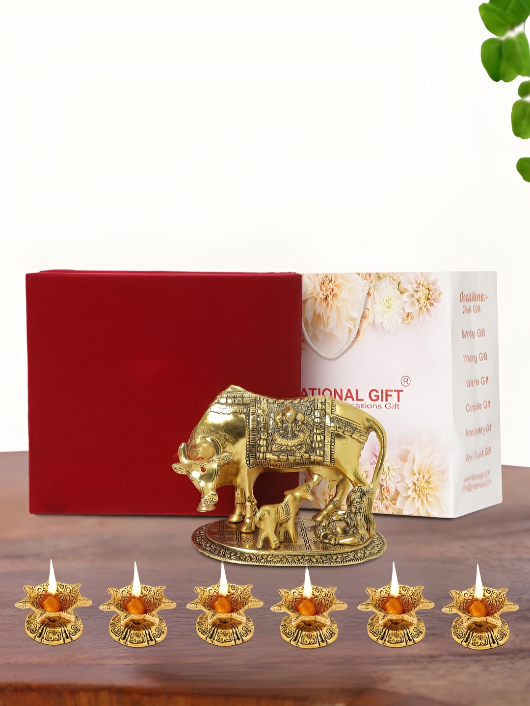 

INTERNATIONAL GIFT Gold Plated Kamdhenu Cow with 6 Diya and Box