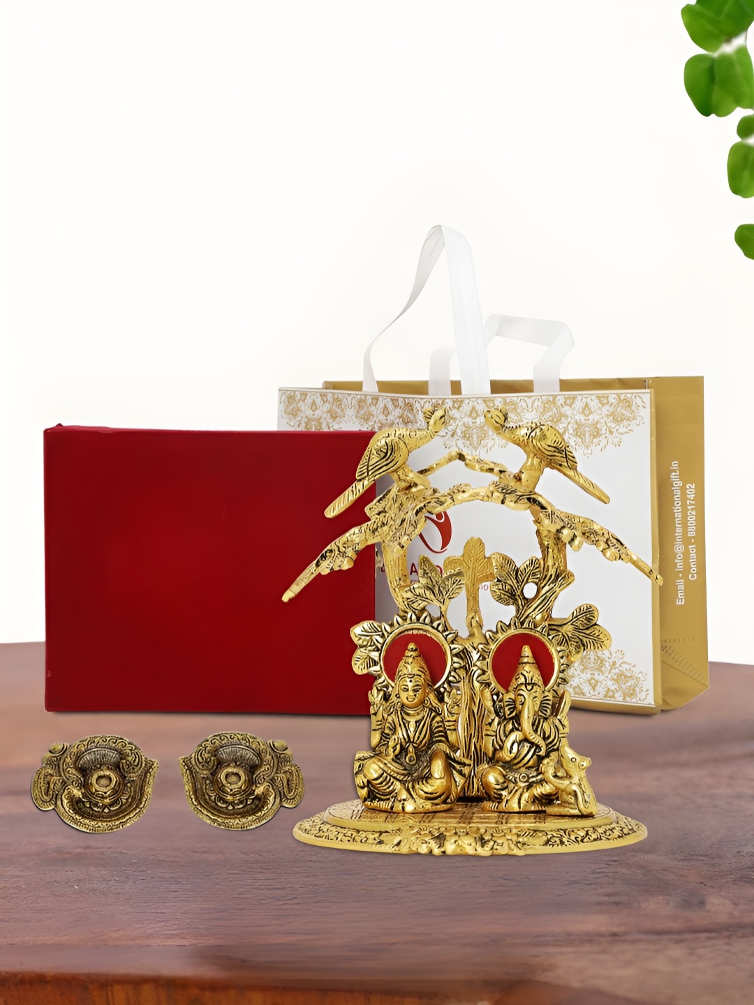 

INTERNATIONAL GIFT Gold Plated Laxmi Ganesh Idol with 2 Diya Box and Bag