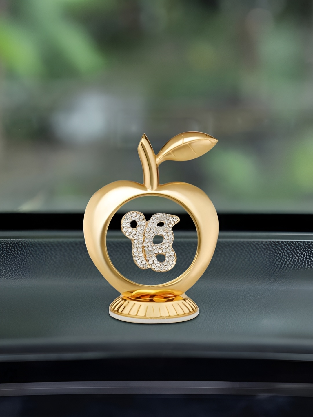 

INTERNATIONAL GIFT Sikh Religious Symbol in Apple Shape for Car Dashboard, Gold