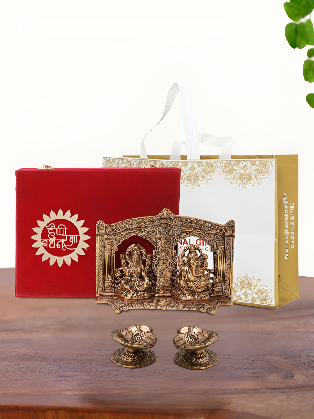 

INTERNATIONAL GIFT Brown Laxmi Ganesh Idol with 2 Diya Box and Bag, Copper
