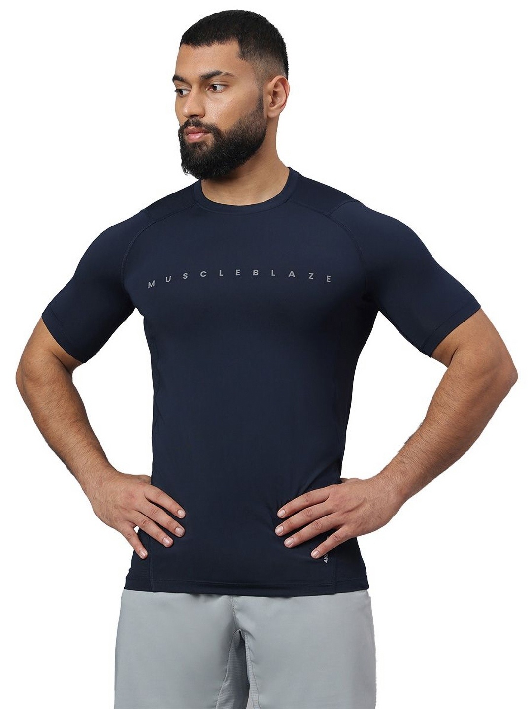 

MuscleBlaze Unisex Brand Logo Printed Round Neck Compression T-shirt, Navy blue